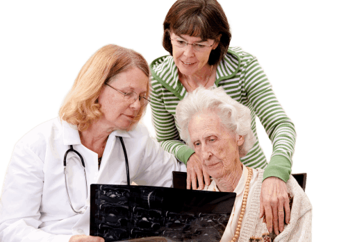 Elderly lady being attended by nurse